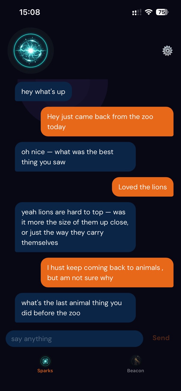 Phone showing a Sparks chat — the teen mentions visiting the zoo and loving lions, and Sparks reflects back curiously asking why they keep coming back to animals.